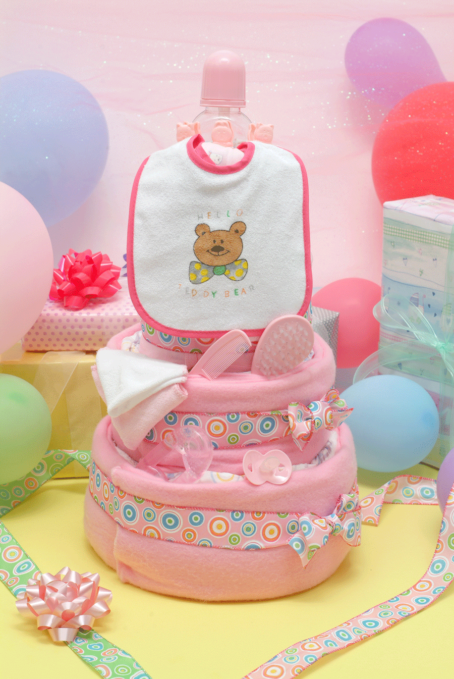 http://www.babybingo.com/*2008/diapercakes/3-tier/3_pink.pngآموزش ساده ساخت كيك پوشك دخترانه